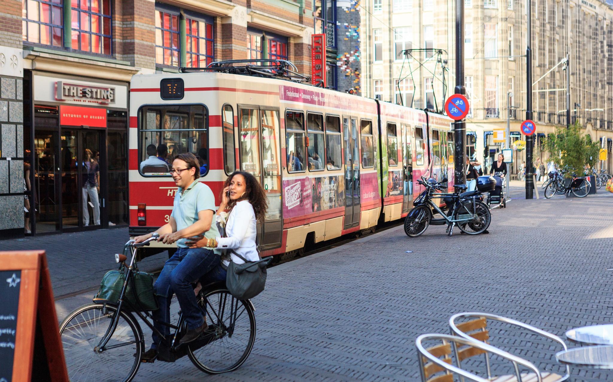 Tram and people.